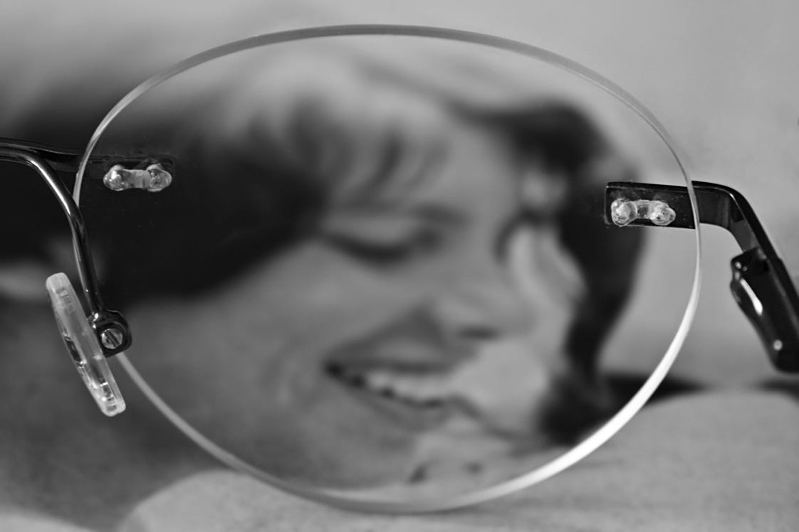 An old photo seen through glasses.